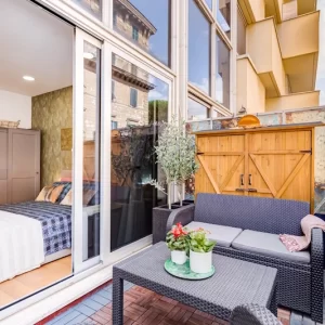 Terrazzo attrezzato dell’appartamento Lovely Home Fabrizia a Roma