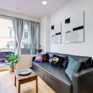 Soggiorno dell’appartamento Lovely Home Fabrizia a Roma, quartiere San Giovanni